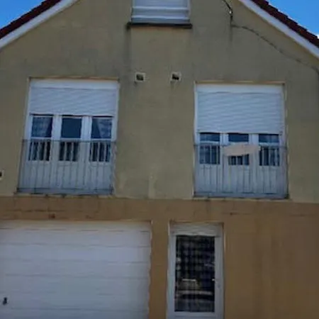Au Rdc D'une Maison